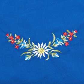 Grembiule blu con disegno di stelle alpine e fiori